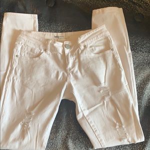 White distressed skinny jeans.